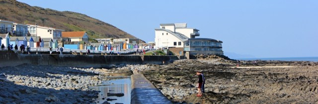  concrete walkway across rocks, Westward Ho, Ruth on the coast