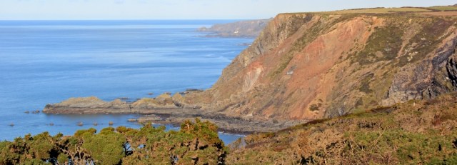 19 Embury Beacon, looking over Gull Rock, Ruth on the South West Coast Path, North Devon