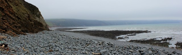 view back to Peppercombe, Ruth walking the coast path, North Devon