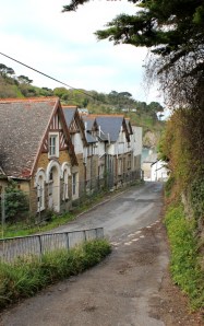  leaving Lee Bay, Ruth walking the South West Coast Path