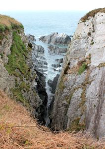  sharp rocks and cliffs, Ruth on the Tarka Trail, North Devon