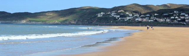walking towards Woolacombe, Ruth on her coast walking