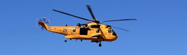 RAF helicoptor, Ruth on her coastal walk, Saunton Sands