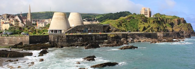 Ilfracombe, view over tourist office from Caspstone Point, Ruth walking the coast