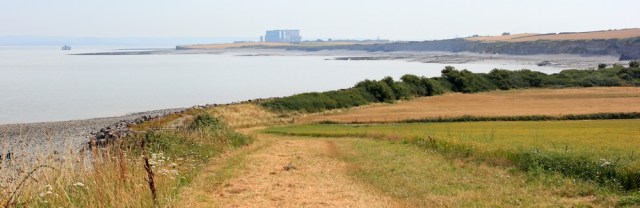 Hinkley Point Power Station, Ruth on her coastal walk on West Somerset Coastal Path