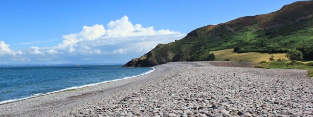  very long shingle beach, Ruth walking past Bossington