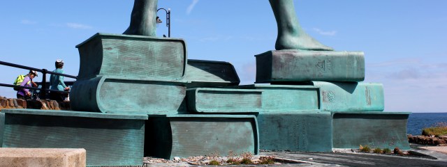 Statue stands on books, Ruth's coastal walk in Ilfracombe