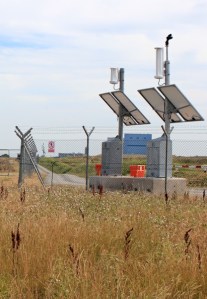 tracking cameras, Hinkley Power Station, Ruth walking the Somerset coast