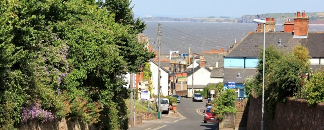 walking down into Watchet, Ruth on her coastal walk, Somerset