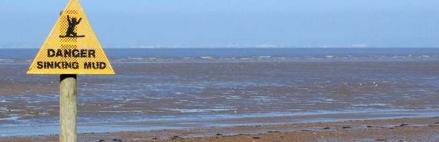 Wales across the mud, from Kewstoke beach, Somerset