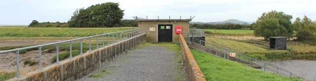 Huntspill Sluice, Ruth walking the coast