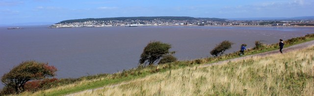 Weston-super-mare on one side, Ruth walking on Brean Down, Somerset
