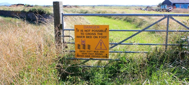warning sign, mud, River Axe, Ruth trying to walk the coast in Somerset