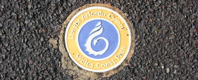 Wales Coast Path sign, embedded in pavement, Ruth's coast walk, Chepstow