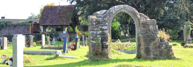 b01 back of St Tewdric's Church, Mathern, Ruth walking the coast in Wales