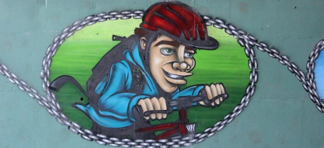 b04 cyclist, graffiti tunnel, Ruth walking towards Chepstow