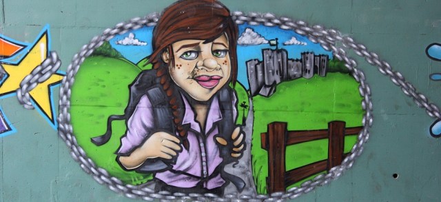 b05 hiker, graffiti tunnel, Ruth walking towards Chepstow