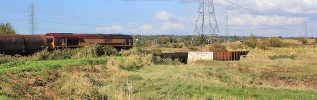 b05 over a railway line, Ruth walking the Coast Path, Wales, near Portskewett