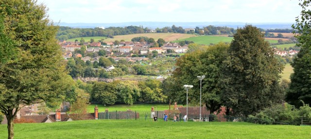 b07 across park towards Sedbury from Chepstow, Ruth hiking in Wales