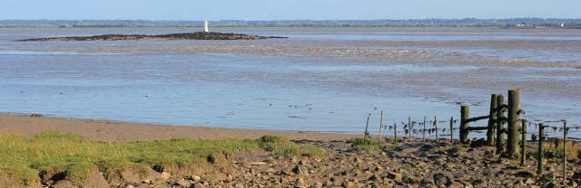 b10 Charston Rock and lighthouse, Ruth walking the Severn shore, Wales