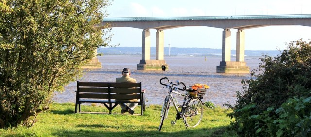 b15 Sudbrook Point and Second Severn Crossing. Ruth walking the Wales Coast Path