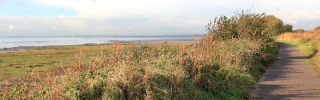  Ruth on Wales Coast Path, Newport Wetlands, river bank