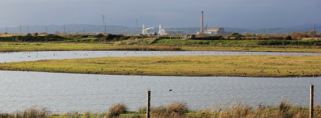 bird hide, Goldcliff, with Newport Power Station behind, Ruth on the Wales Coast Path