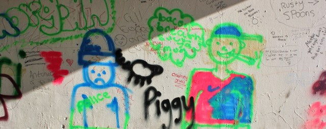 very poor graffiti, Ruth walking through Newport, Wales Coast Path