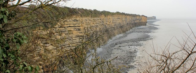 16 cliffs towards Rhoose Point, Ruth walking the Welsh coast