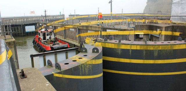 b02 Cardiff Bay Barrage and Barrage Circles, Ruth walking the Wales Coast