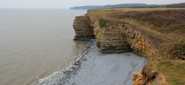  looking towards St Donat's Point, Ruth on her coastal walk in Wales