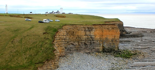Nash Point light houses, Ruth on Wales Coast Path