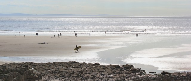 a06 surfing beach, Rest Bay, Ruth walking the welsh coast