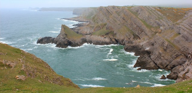 07 above The Knave, Ruth walking towards The Worm's Head, Gower