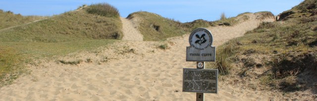 staggering through sand dunes, Ruth in Three Cliffs Bay, Gower