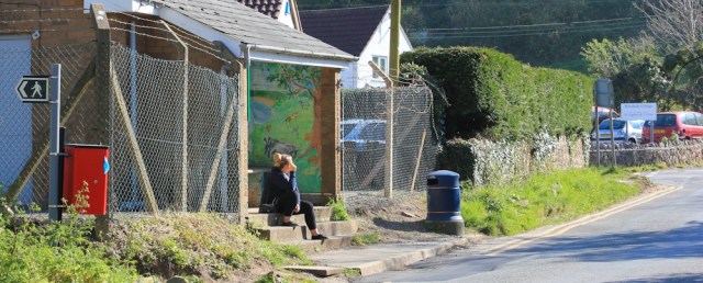  bus-stop at Oxwich, Ruth walking the Wales Coast Path