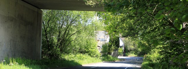under A484 into Loughor, Ruth walking the Wales Coast