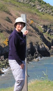 Ruth standing on Twlc Point, Gower. Broughton Bay