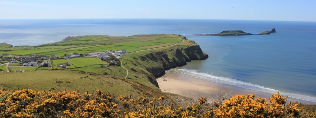 18 Rhossili from Rhossili Down, Ruth walking the coast