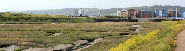b12 walking towards Seaside, Llanelli, Ruth on the Wales Coast Path