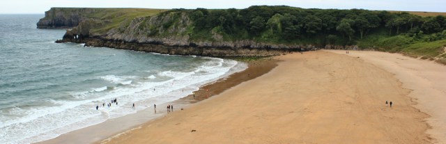 01 Barafundle Bay again, Ruth walking in Pembrokeshire