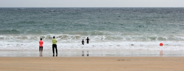 02 swimmers in sea, Barafundle Bay, Ruth hiking the Pembrokeshire Coast Path