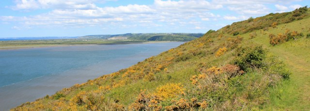10 towards mouth of River Taf, Ruth walking th Wales Coast Path