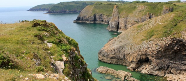 12 Skomar, Ruth walking the coast near Manorbier