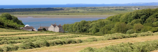 13 over River Taf towards Tenby, Ruth walking in Wales