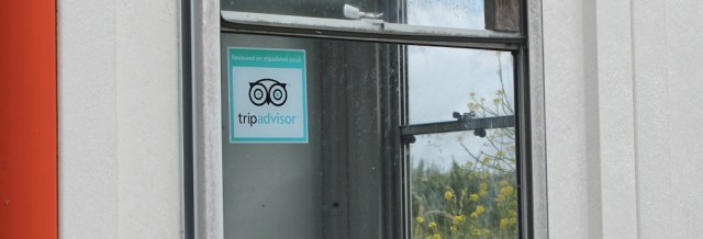 TripAdvisor sticker in checkpoint window, Ruth in Castlemartin