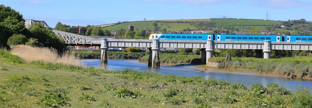 a05 train crossing over River Towy, Ruth walking the Wales Coast Path, Carmarthen