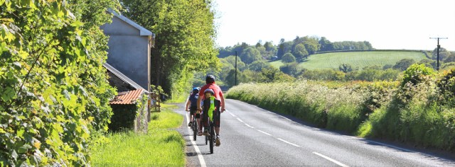 a08 walking on road B4312, Ruth on Wales Coast Path