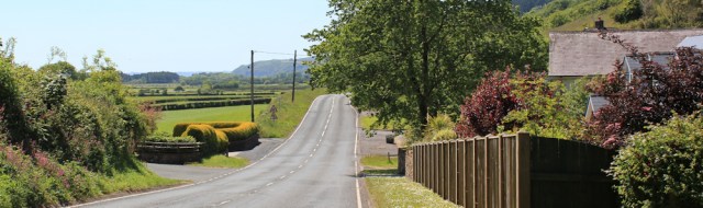 road walking A4066. Ruth on Wales Coast Path to Pendine