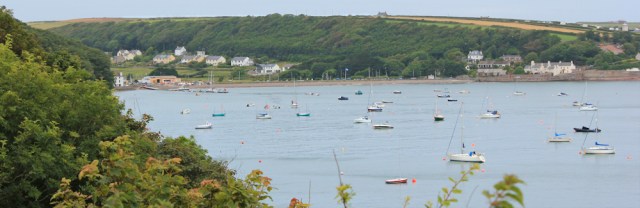 03 views over Dale, Ruth hiking to St Ann's Head, Pembrokeshire Coast Path